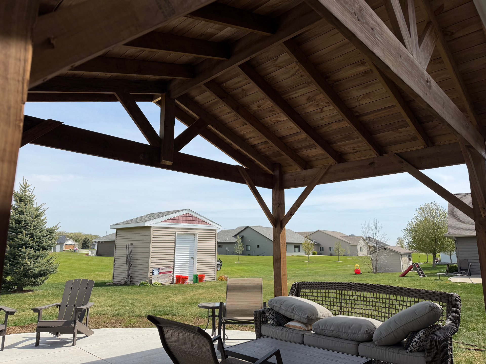 Interior view of a cedar timber-frame covered patio built in central Minnesota